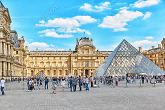 PARIS, FRANCE - JULY 06, 2016 : Glass pyramid and the Louvre mus