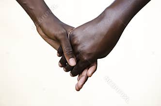 Friendship Symbol: Black People Holding Hands Together
