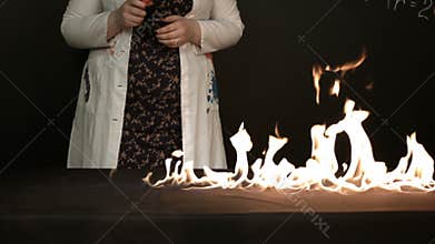 Ignition of alcohol vapors. Slow motion closeup