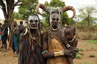 Baby, mom and grandmother of mursi ethnicity