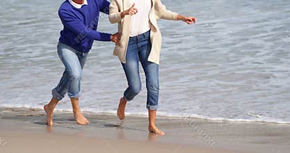 Mature couple enjoying on beach
