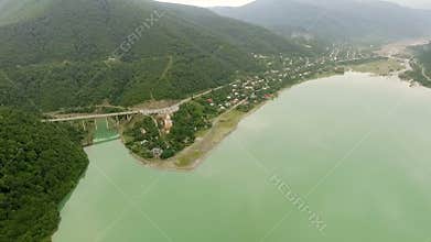 Picturesque landscape, mountains, sea, castle. Ananuri, Georgia. Ðerial survey monastery.