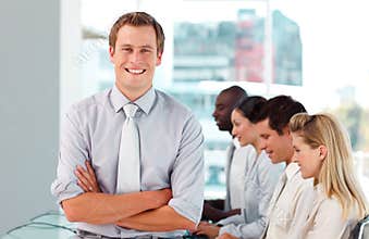 Happy male boss leading his team
