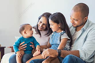 Family playing with baby