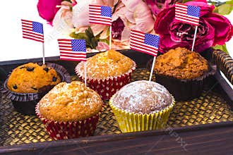 Variety of swiit desserts on the table for July 4th party. Whit