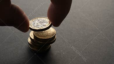Building British One Pound Sterling coin stack