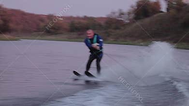 Extreme racing skiing on the water at sunset. Very cool entertainment.