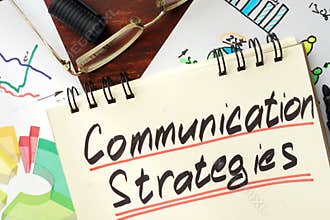 Notepad with sign Communication Strategies.