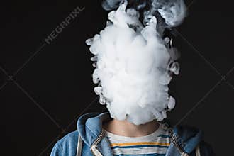 The face of vaping young man