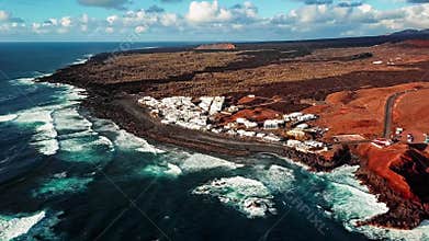 Flying over volcanic Lake El Golfo, Lanzarote, Canary Islands, Spain