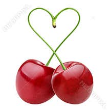 Heart shape from two cherries over white