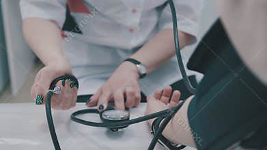 Blood pressure measuring. Doctor and patient. Health care.