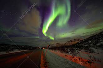 Amazing multicolored Aurora Borealis also know as Northern Lights in the night sky over Lofoten landscape, Norway, Scandinavia. Bl