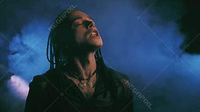 Cute male vampire with dreadlocks