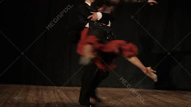 Couple, young beautiful woman and young man dance