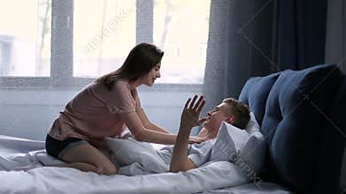 Sensual couple in love in bed during morning