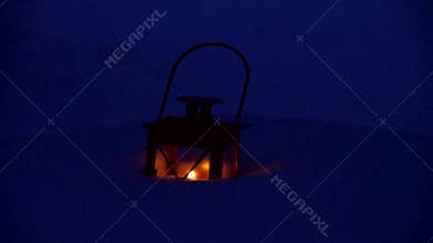 Lantern in snow