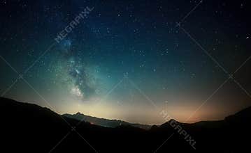 Night sky stars with milky way on mountain background