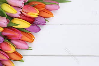 Tulips flowers in spring or mother's day on wooden board
