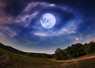 Beautiful night sky with the full moon and stars