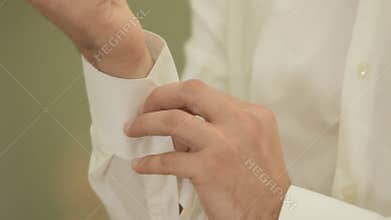 The groom wears for a wedding