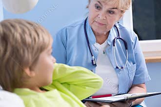Checking boy's condition