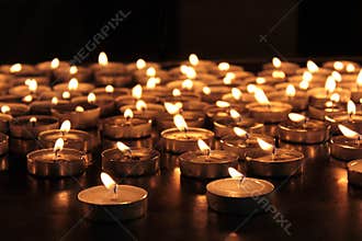 Burning memorial candles