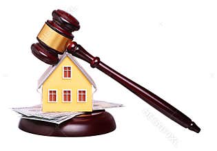 Concept of house sale with gavel and money isolated