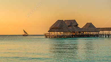 Bar on water at sunset in Zanzibar, Tanzania
