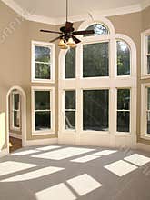 Luxury Model Home Living Room Arched Window Wall