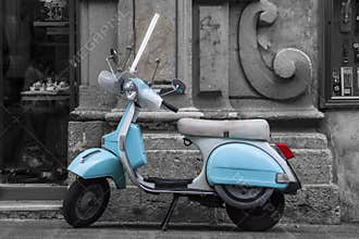 Historic Italian colored motorcycle scooter. Black and white