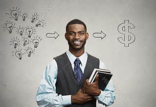 Man holding books has ideas ready for financial success
