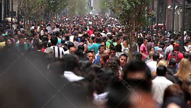 Mexico City, Mexico-CIRCA June,2014: Crowd walking through street.