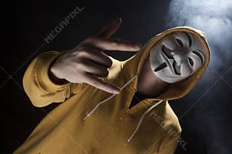 Anonymous activist hacker with mask studio shot