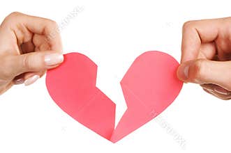 Man woman hands holding broken heart