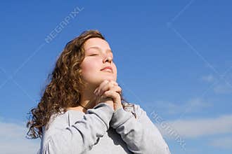 Teenager praying