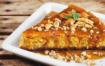 Homemade Pumpkin cheesecake with almonds and walnuts