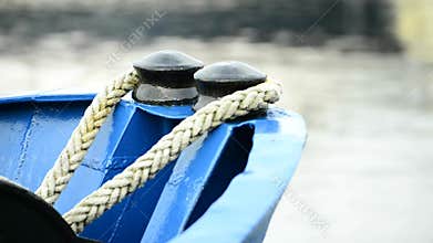 Ship bow with mooring lines