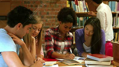 Students revising together in the library