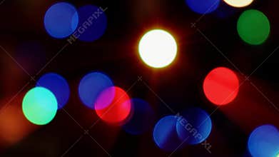 Blurred abstract moving lights Bokeh effect. Christmas tree. 4K background