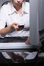Woman texting boss