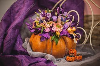 Beautiful fall bouquet in vase from pumpkin