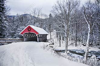 Covered bridge snowfall in rural New Hampshire