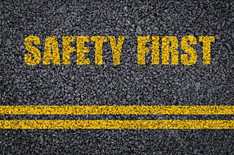 Road safety concept: Safety first on asphalt with centre lines