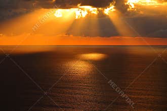Golden morning at calm sea, aerial view