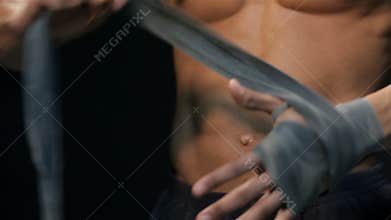 Close up man pulls the belt on the hand