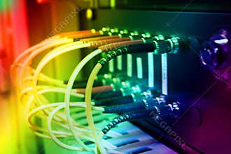 Optic fiber cables connected to a switch