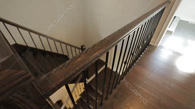 Motorized dolly shot of wooden stairs