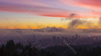 Time Laspe of thick rolling fog and clouds over Portland Oregon and mt. hood at Sunrise one Winter Morning