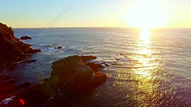 Pacific ocean coast bay at sunset